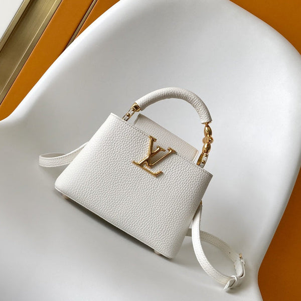 CAPUCINES EAST-WEST MINI 21 IN WHITE TAURILLON LEATHER GOLD-TONE HARDWARE